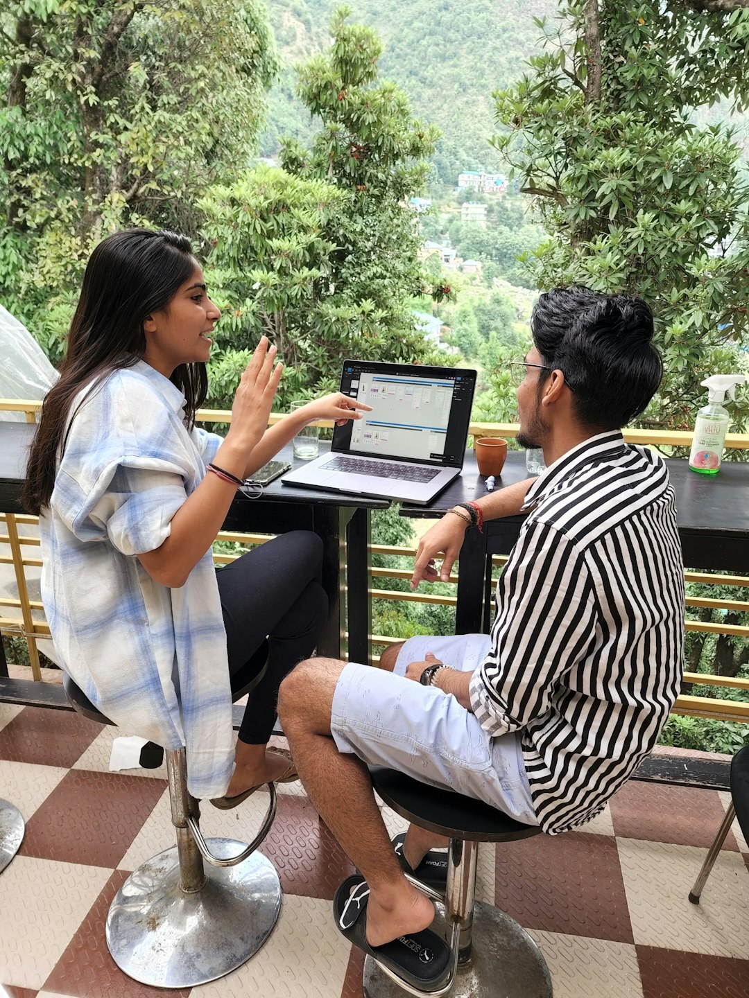 Colleagues talking during a meeting in the office